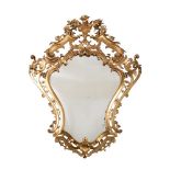 A VICTORIAN CARVED GILTWOOD MIRROR