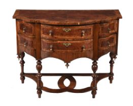 A WALNUT AND CROSS BANDED SIDE TABLE IN WILLIAM & MARY STYLE
