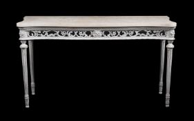 A CARVED WOOD AND PAINTED GESSO SERPENTINE FRONTED CONSOLE TABLE, IN GEORGE III STYLE