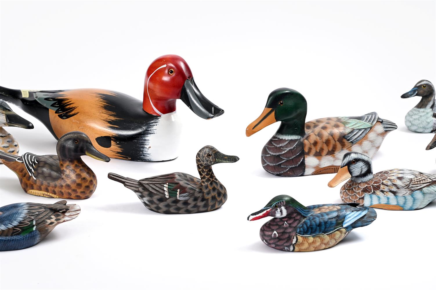 A COLLECTION OF APPROXIMATELY TWELVE CARVED AND PAINTED WOOD MODELS OF DUCKS - Image 2 of 2