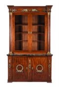 A MAHOGANY, GILT METAL MOUNTED AND MARBLE BOOKCASE, IN EMPIRE STYLE