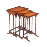 A NEST OF THREE EDWARDIAN MAHOGANY AND SATINWOOD OCCASIONAL TABLES