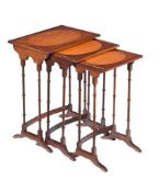 A NEST OF THREE EDWARDIAN MAHOGANY AND SATINWOOD OCCASIONAL TABLES