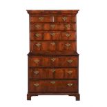 A GEORGE III WALNUT CHEST ON CHEST