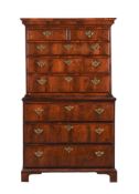 A GEORGE III WALNUT CHEST ON CHEST