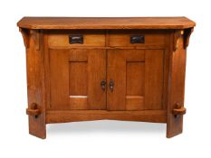 AN ARTS AND CRAFTS OAK SIDEBOARDBY LEE, LONGLAND & CO.