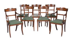 A SET OF SEVEN SHERATON REVIVAL SATINWOOD AND POLYCHROME PAINTED DINING CHAIRS