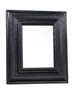 A LARGE CARVED AND EBONISED MIRROR, IN FLEMISH 17TH CENTURY STYLE, LATE 19TH OR EARLY 20TH CENTURY