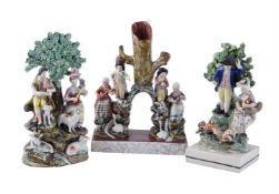 THREE VARIOUS STAFFORDHIRE PEARLWARE FIGURAL GROUPS