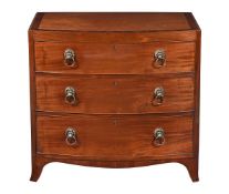 A GEORGE III MAHOGANY AND LINE INLAID CHEST OF DRAWERS
