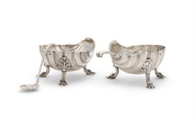 A MATCHED PAIR OF GEORGE III SILVER SHELL SHAPED SALTS EDWARD WAKELIN, LONDON 1760 AND 1764