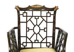 A BLACK LACQUER AND CHINOISERIE DECORATED COCKPEN ARMCHAIR IN GEORGE III STYLE