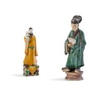 A CHINESE 'SANCAI' GLAZED MODEL OF AN IMMORTAL AND CHILDIN KANGXI STYLE22.5cm highTogether with a