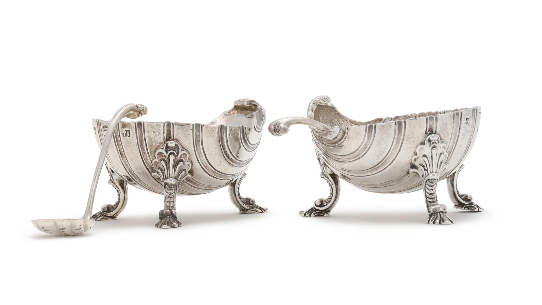 A MATCHED PAIR OF GEORGE III SILVER SHELL SHAPED SALTS EDWARD WAKELIN, LONDON 1760 AND 1764 - Image 2 of 3