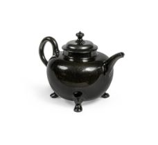 AN ENGLISH BLACK-GLAZED RED POTTERY TEAPOT AND COVER OF JACKFIELD POTTERY TYPE MID 18TH CENTURY