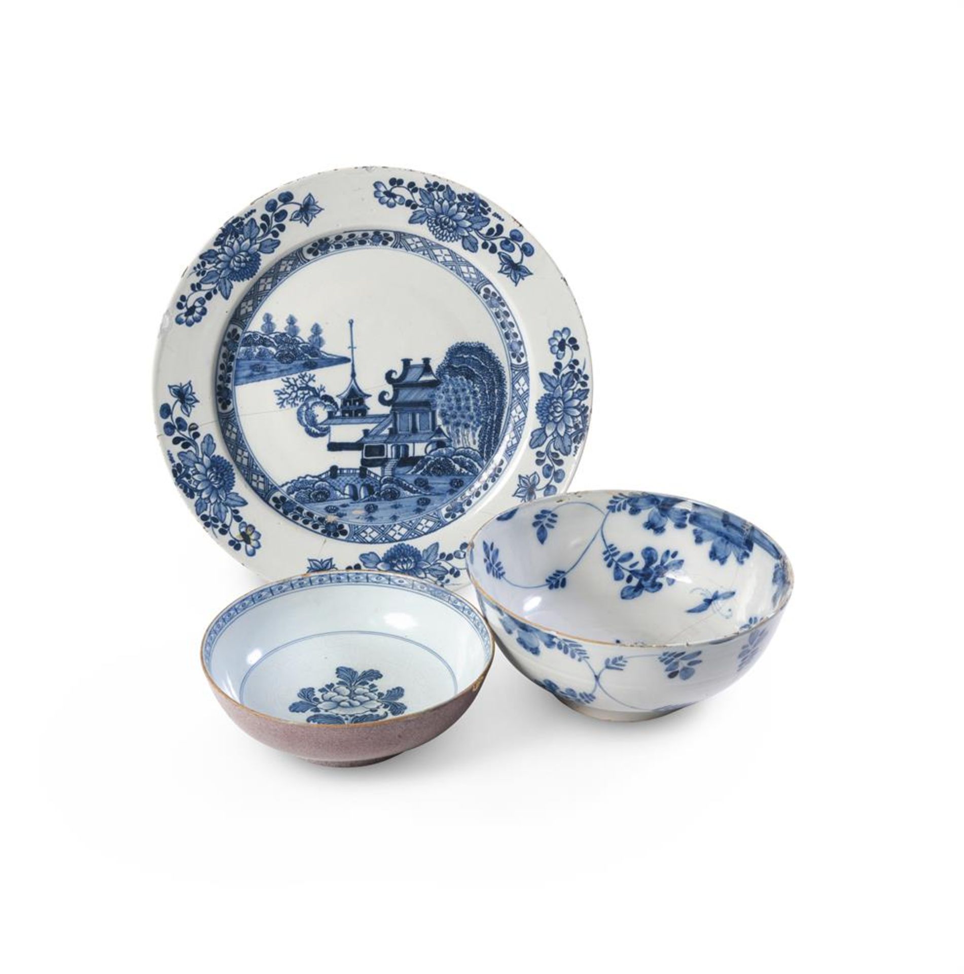 AN ENGLISH DELFT BLUE WHITE AND MANGANESE SMALL PUNCH BOWL, CIRCA 1760