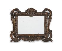 AN ITALIAN CARVED GILTWOOD PICTURE FRAME WALL MIRROR, 17TH CENTURY AND LATER
