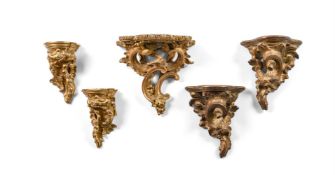 A GROUP OF FIVE SMALL CARVED GILTWOOD WALL BRACKETS, 19TH CENTURY AND LATER