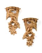 A PAIR OF GEORGE III CARVED GILTWOOD EAGLE WALL BRACKETS, CIRCA 1760-1780