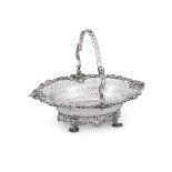 A GEORGE II SILVER SHAPED OVAL SWING HANDLED BASKET