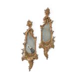 A PAIR OF SMALL CARVED GILTWOOD WALL MIRRORS IN THE GEORGE III STYLE, 19TH CENTURY