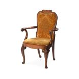 A CARVED WALNUT AND UPHOLSTERED UPEN ARMCHAIR IN GEORGE II STYLE, 20TH CENTURY