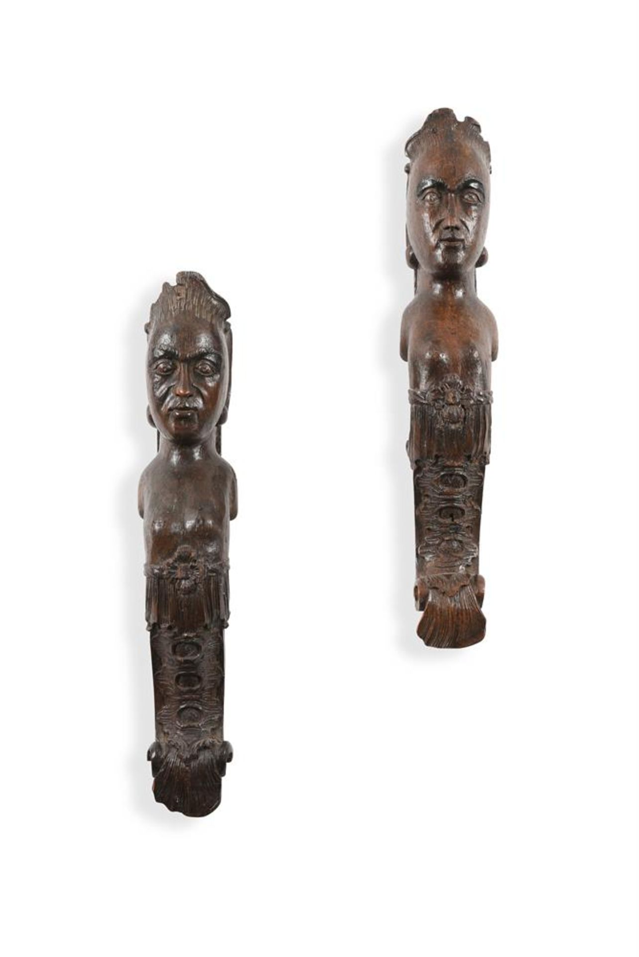 A PAIR OF CARVED OAK HERM FIGURES, 18TH CENTURY AND LATER