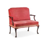 A CARVED MAHOGANY AND VELVET UPHOLSTERED SETTEE IN GEORGE II STYLE, 19TH CENTURY