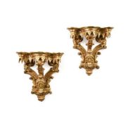 A PAIR OF CARVED GILTWOOD AND GESSO WALL BRACKETS IN THE REGENCE STYLE, 19TH CENTURY