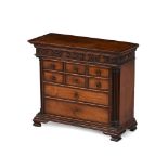 A GEORGE III FRUITWOOD AND YEW CROSSBANDED MINIATURE CHEST OF DRAWERS, CIRCA 1780