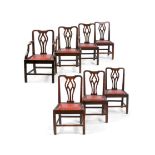 A SET OF SEVEN GEORGE III MAHOGANY AND LEATHER UPHOLSTERED DINING CHAIRS, THIRD QUARTER 18TH CENTURY