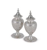 A PAIR OF VICTORIAN SILVER CASTERS, IN THE GOTHIC TASTE, MAKER'S MARKS OBSCURED, BIRMINGHAM 1858