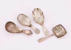 FOUR SILVER CADDY SPOONS WITH SHELL SHAPED BOWLS