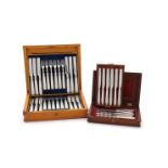 Y A CASED SET OF EIGHTEEN VICTORIAN SILVER FRUIT KNIVES AND FORKS