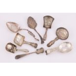 A COLLECTION OF SILVER CADDY SPOONS