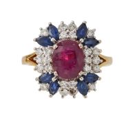 A RUBY, SAPPHIRE AND DIAMOND CLUSTER RING, LONDON 1994