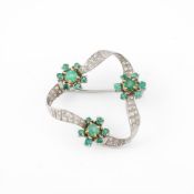 AN EMERALD CLUSTER AND DIAMOND HOOPED BROOCH, LONDON 1975 IMPORT MARK