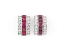 A PAIR OF RUBY AND DIAMOND CURVED EARRINGS