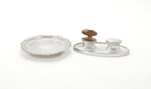 A SILVER OVAL DOUBLE INKWELL