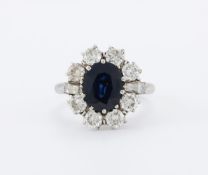 A SAPPHIRE AND DIAMOND CLUSTER RING, LONDON 2007
