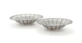 A VICTORIAN PAIR OF SILVER SHAPED OVAL PIERCED DISHES