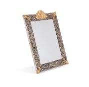 A SILVER COLOURED AND GILT WALL MIRROR