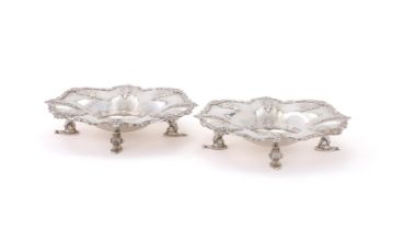 A PAIR OF SILVER SHAPED CIRCULAR DISHES