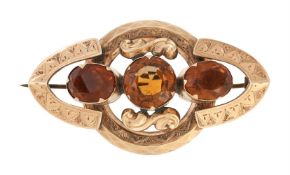 A VICTORIAN CITRINE ROLLED GOLD BROOCH, CIRCA 1870