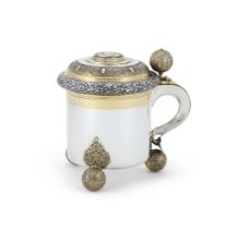 A SWEDISH SILVER AND SILVER GILT LIDDED TANKARD