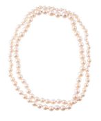 AN OPERA LENGTH STRAND OF CULTURED PEARLS