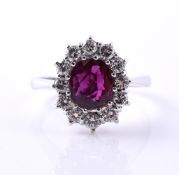 A RUBY AND DIAMOND CLUSTER RING, LONDON 1974