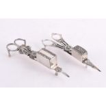 TWO PAIRS OF ELECTRO-PLATED CANDLE SNUFFERS