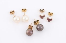 TWO PAIRS OF CULTURED PEARL EARSTUDS, AND A PAIR OF RUBY AND CULTURED PEARL EAR STUDS