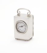 A SILVER CASED CARRIAGE CLOCK